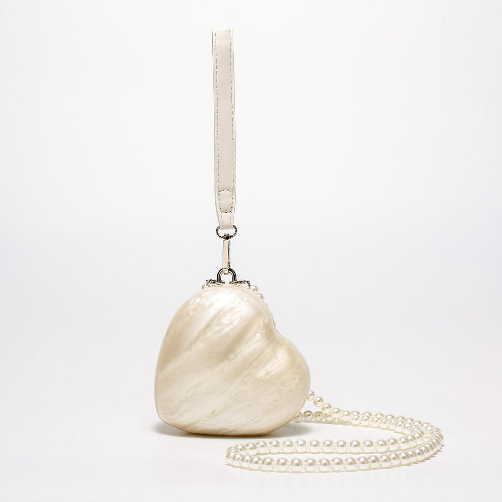 La Pearla Shell Like Clutch and Crossbody Vista